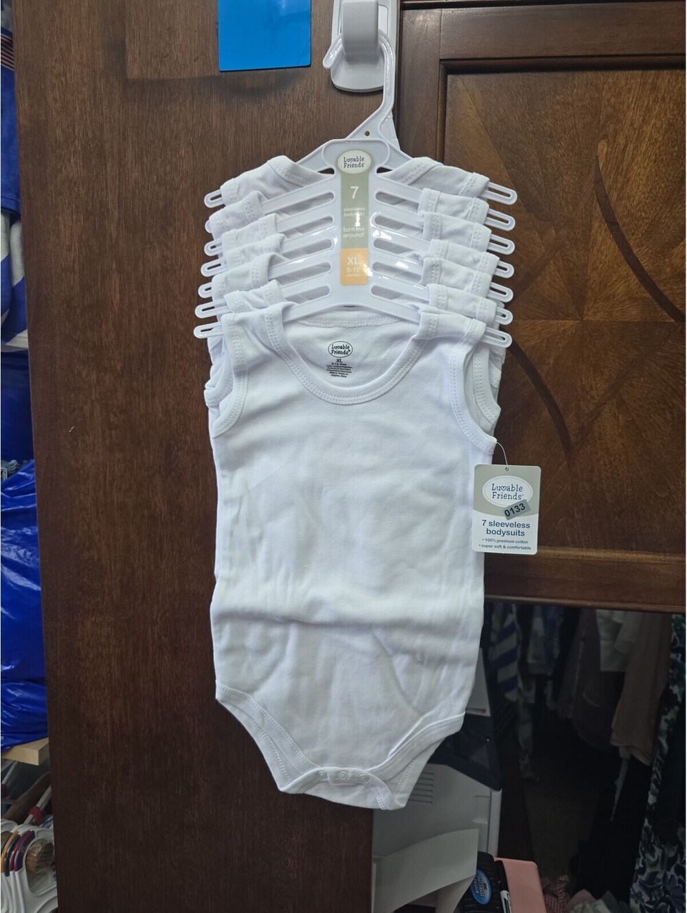 9 to 12m brand new, sleeveless body suits from target Item 133G5